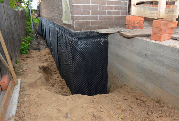 Happy homeowners after waterproofing job in Glen Rock